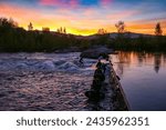 Sunset surfing on the Boise River wave in Boise, Idaho