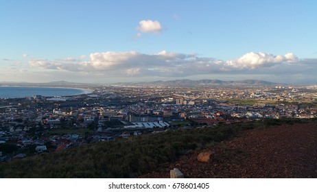 Sunset at Table Bay and northern districts of Cape Town (Woodstock, Milnerton, Bloubergstrand), Western Cape, South Africa