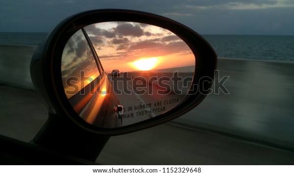 Sunset taken by car side
mirror