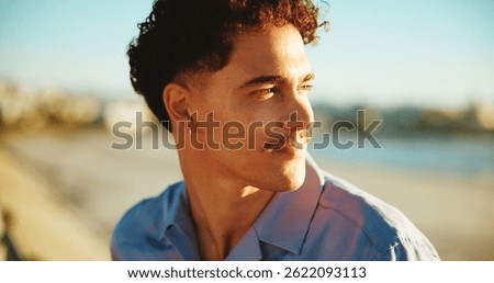 Sunset, thinking and beach with man, vacation and nature with memory, reflection and wonder. Seaside, summer holiday and happy person with weekend break, decision and choice with peace or travelling