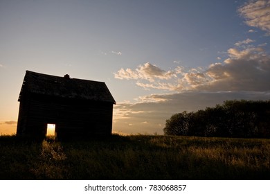 Sunset through barn