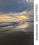 Sunset through the clouds over the ocean at Myrtle Beach, South Carolina