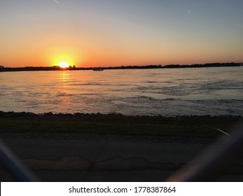 Sunset Through Fence At Tom Lee Park, Memphis, TN