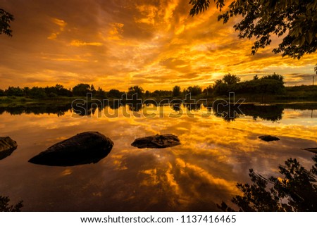 Sunset through the rain clouds