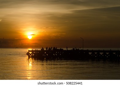 Sunset time by the pier 