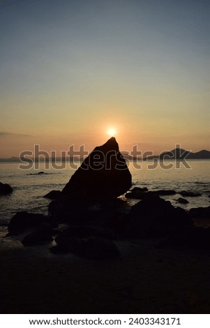 sunset at the tip if the rock in dadaepo beach busan southkorea