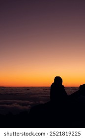 Sunset at the top with people in the background