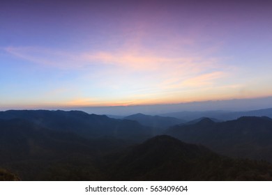 Sunset at twilight in Doi Pha Ngom, Khun Chae National Park, Wiang Pa Pao district of Chiang Rai Province Thailand. - Shutterstock ID 563409604