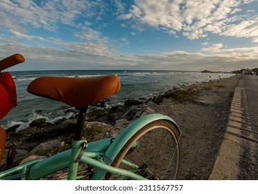 Sunset with two bikes on the beach at Tulum, Mexico - Shutterstock ID 2311567757