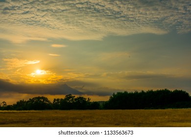 Sunset under the field 