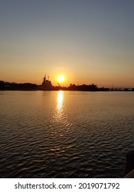 Sunset With The USS North Carolina