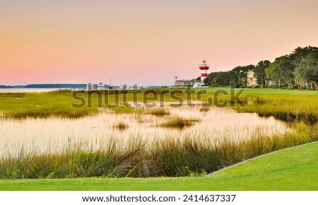 Sunset view of the 18th hole at Harbour Town Golf Course on Hilton Head Island looking towards their famous lighthouse. 
