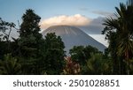 Sunset view of Arenal Volcano and tropical rain forest near La Fortuna, in Costa Rica, central America