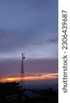 sunset view behind a tower