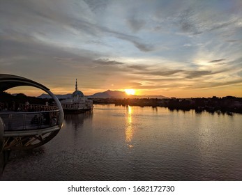 A sunset view from a bridge.