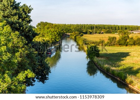 Sunset view British rural landscape scene with river near Northampton