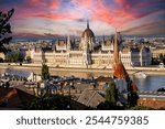 Sunset view of Budapest, highlighting the historic Parliament, Danube River, and iconic landmarks like Buda Castle and Chain Bridge. Perfect for showcasing Hungary’s stunning architecture and vibrant