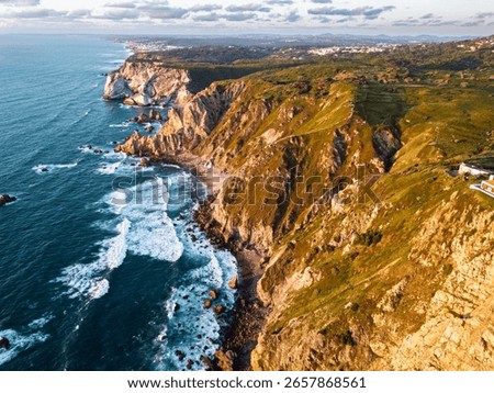 Sunset View of Cabo da Roca Lighthouse and Cliffs. Aerial drone 