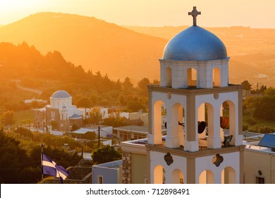 Sunset view with church belfry from Asfendiou village in Kos island Greece