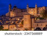 Sunset view of the cityscape of Urbino, Italy.