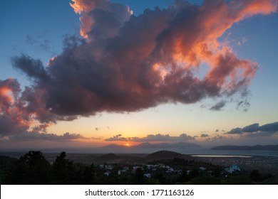 Sunset view with clouds and sun rays from Zia Village, in Kos Island, Greece.