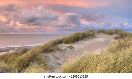 Sunset View From Dune On North Sea And Canal In Zeeland, Netherlands