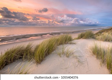 Sunset View From Dune Over North Sea And Canal In Zeeland, Netherlands