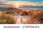 Sunset View from dune top over North Sea from the island of Ameland, Friesland, Netherlands