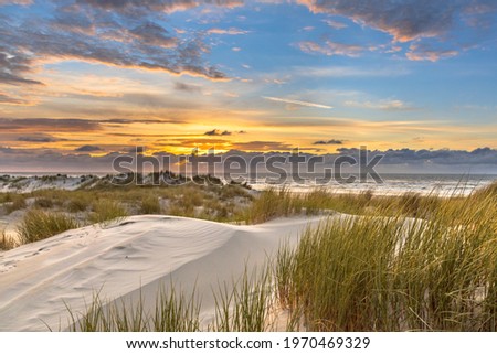 Similar – Image, Stock Photo Ameland | Beach, sea and clouds in soft light