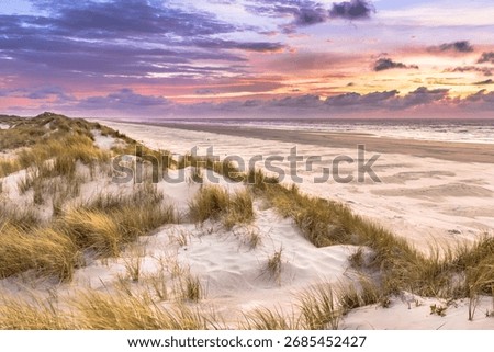 Sunset View from dune top over North Sea from the island of Ameland, Friesland, Netherlands