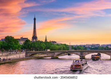 Sunset view of Eiffel tower and Seine river in Paris, France. Eiffel Tower is one of the most iconic landmarks of Paris. Cityscape of Paris - Shutterstock ID 2045606852