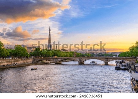 Sunset view of Eiffel tower and Seine river in Paris, France. Eiffel Tower is one of the most iconic landmarks of Paris. Cityscape of Paris
