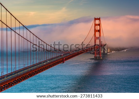 Sunset view of the Golden Gate Bridge and fog from Battery Spencer,  Golden Gate National Recreation Area, in San Francisco, California.