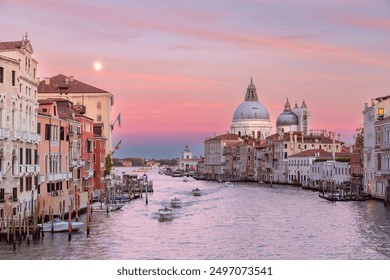 Sunset view of the Grand Canal and Basilica di Santa Maria della Salute in Venice, Italy - Powered by Shutterstock