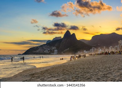 Sunset view of Ipanema beach, Leblon beach and the Mountain Dois Irmao in Rio de Janeiro, Brazil. Ipanema beach is the most famous beach of Rio de Janeiro, Brazil. Sunset cityscape of Rio de Janeiro