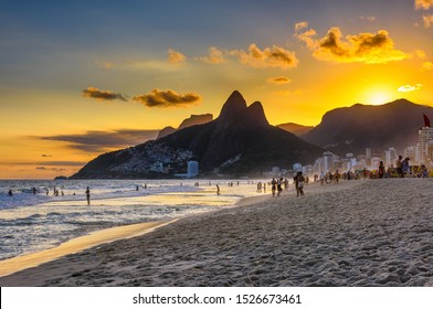 Sunset view of Ipanema beach, Leblon beach and the Mountain Dois Irmao in Rio de Janeiro, Brazil. Ipanema beach is the most famous beach of Rio de Janeiro, Brazil. Cityscape of Rio de Janeiro