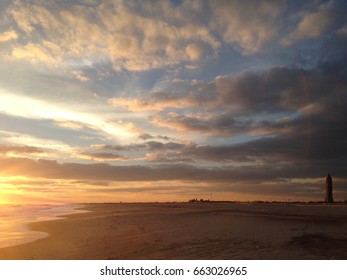 Sunset View Of The Jones Beach Water Tower From A Distance.