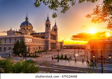 Sunset View Of Madrid Cathedral Santa Maria La Real De La Almudena In Madrid, Spain. Architecture And Landmark Of Madrid. Night Cityscape Of Madrid