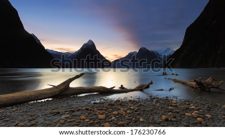 Sunset view at Milford Sound lakeside, with Mitre Peak mountain on the back. Located in South Island of New Zealand.
