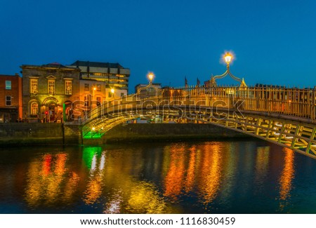 Sunset view of the Millenium bridge in Dublin, Ireland