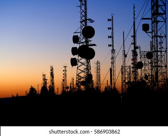 Sunset View of Mountain Top Communications Towers