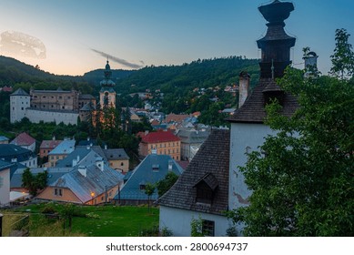 Sunset view of the old castle overlooking Banska Stiavnica in Slovakia.IMAGE