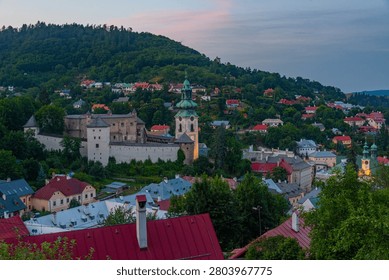 Sunset view of the old castle overlooking Banska Stiavnica in Slovakia.IMAGE