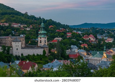Sunset view of the old castle overlooking Banska Stiavnica in Slovakia.IMAGE