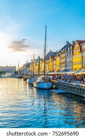 Sunset view of old Nyhavn port  in the central Copenhagen, Denmark.
