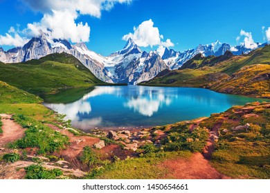 Sunset  view on Bernese range above Bachalpsee lake. Popular tourist attraction. Location place Swiss alps, Grindelwald valley, Europe. 