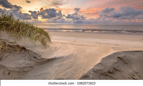 Sunset View On North Sea And Canal Fom Dunes In Zeeland, Netherlands