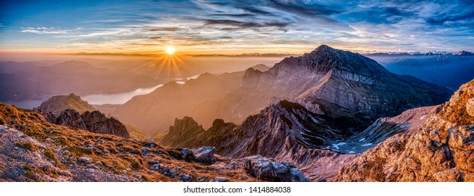 Sunset view on the top of Grigna Meridionale - aka Grignetta - in the Lake of Como district near Lecco. Red sky and a nice view. Mountain landscape, Italy - Shutterstock ID 1414884038