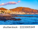 Sunset view of Playa de los Cristianos at Tenerife, Canary islands, Spain.