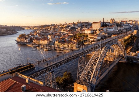 Sunset view of Ponte Luis I Bridge in Porto, Portugal
